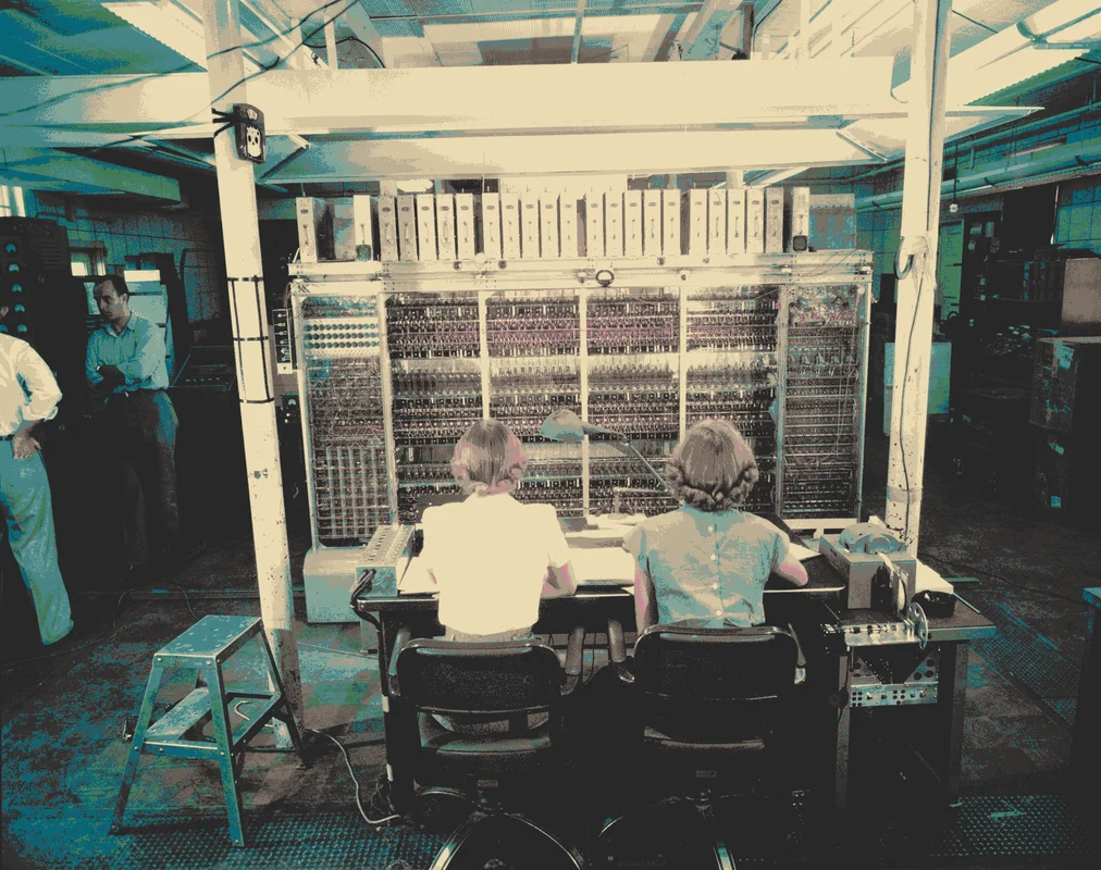 Operators in front of the MANIAC computer.